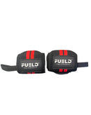 Pair of black wrist wraps with red straps and 'FUEL' branding on a gray background