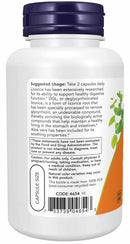 Vitamins bottle with label on a white background