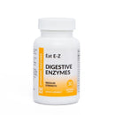 A white plastic bottle of Dynamic Enzymes Eat E-Z Digestive Enzymes Regular Strength dietary supplement, featuring a white cap and a label with orange and black text.