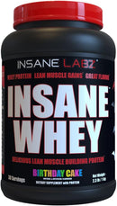 Insane Whey protein supplement container with red lid and black label on a white background
