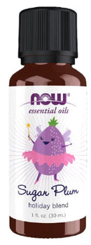 A 1 fl. oz. (30 mL) bottle of NOW Essential Oils Sugar Plum holiday blend essential oil on a solid black background.
