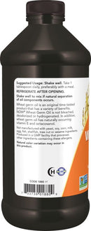 Bottle of NOW Foods Wheat Germ Oil with label and barcode on a black background